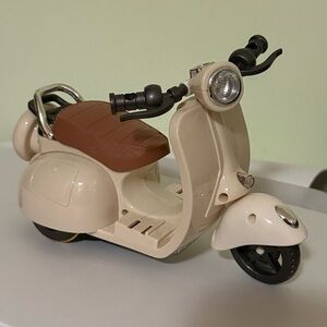 Cream and Brown Toy Scooter with light & sounds.